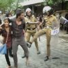 හිතට වද දෙන ඡායාරූපයක් - Act of sadism by a Sri Lankan Policeman?